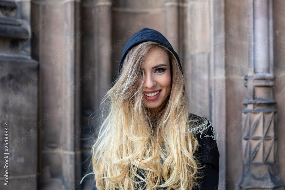 Fototapeta premium young sexy russian hard rock biker girl in the city of eden