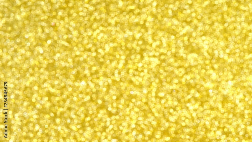 Golden background. Gold shining sparkles underwater, beautiful abstract texture. Golden background. Gold shining sparkles underwater, beautiful abstract texture.