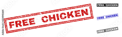 Grunge FREE CHICKEN rectangle stamp seals isolated on a white background. Rectangular seals with grunge texture in red, blue, black and gray colors.