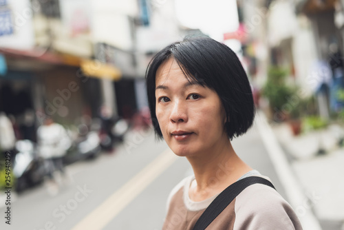 Asian woman walking on the street Free Download Asian woman walking on the street - GFXLoad