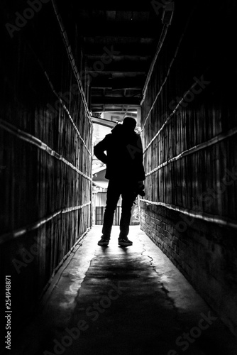 silhouette of man in the tunnel