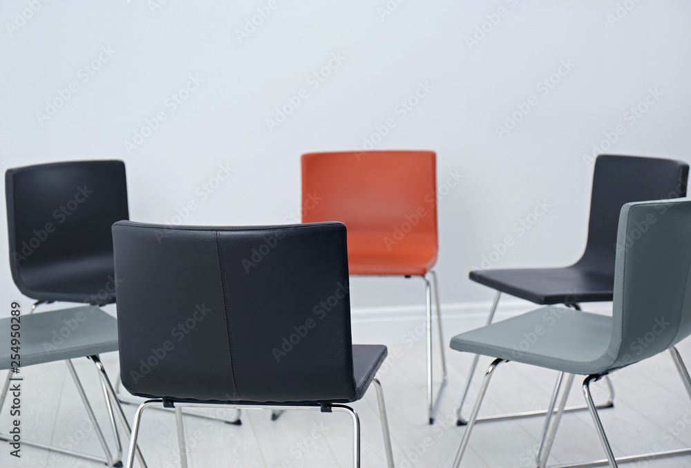 Chairs prepared for group therapy session in office. Meeting room interior Chairs prepared for group therapy session in office. Meeting room interior