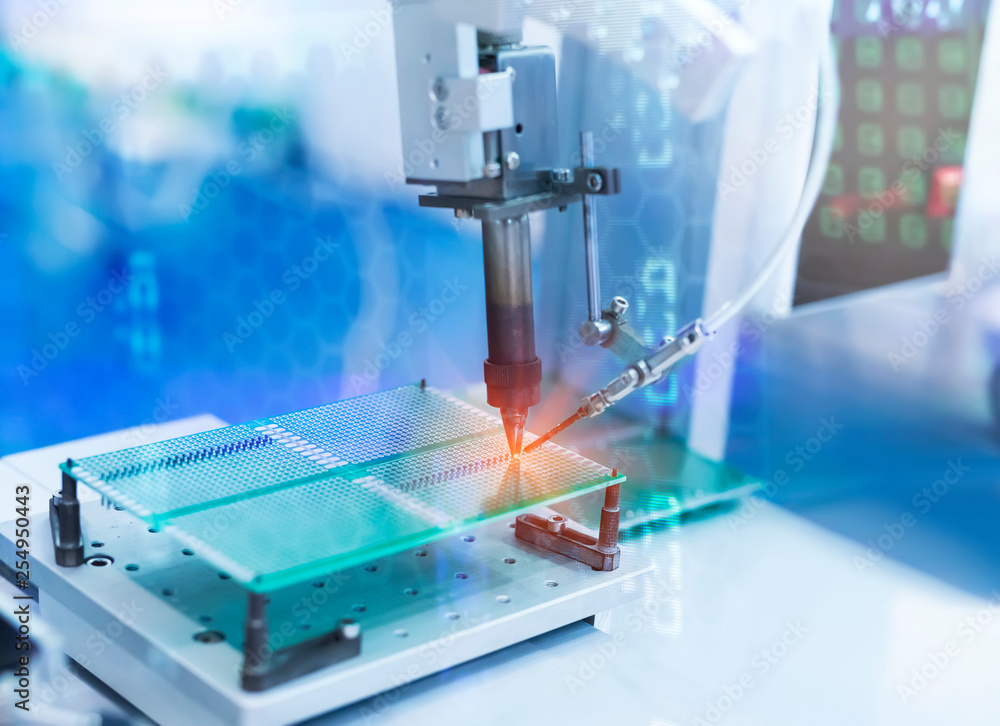 soldering iron tips of robotic system for automatic point soldering for printed and assembly electric circuit board ( PCB ) at factory soldering iron tips of robotic system for automatic point soldering for printed and assembly electric circuit board ( PCB ) at factory