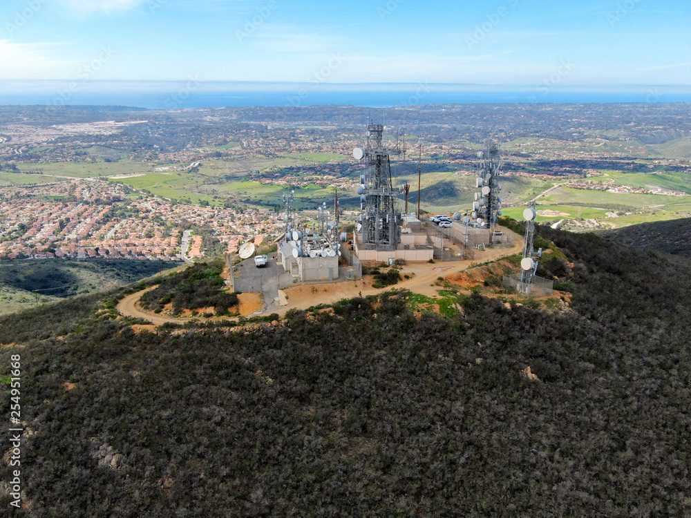 Aerial view of telecommunication antennas on the top of Black Mountain in Carmel Valley, SD, California, USA.  Television, radio and communications antenna with numerous transmitters, Technology.
