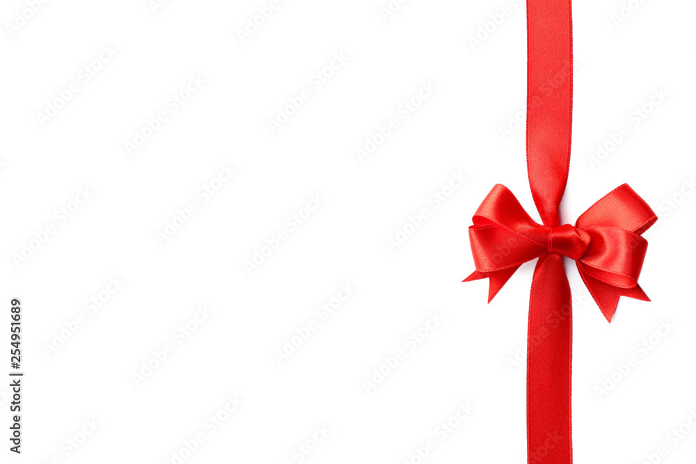 Red ribbon with bow on white background. Festive decoration Red ribbon with bow on white background. Festive decoration
