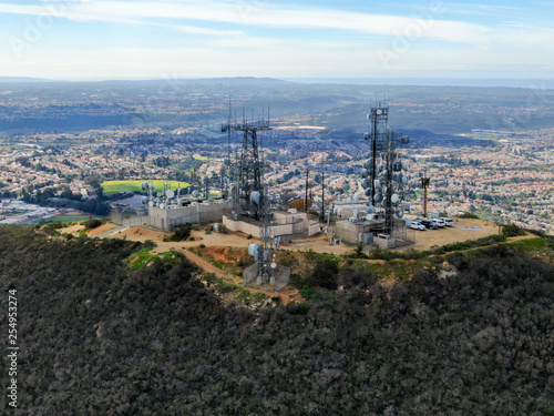 Aerial view of telecommunication antennas on the top of Black Mountain in Carmel Valley, SD, California, USA. Television, radio and communications antenna with numerous transmitters, Technology.