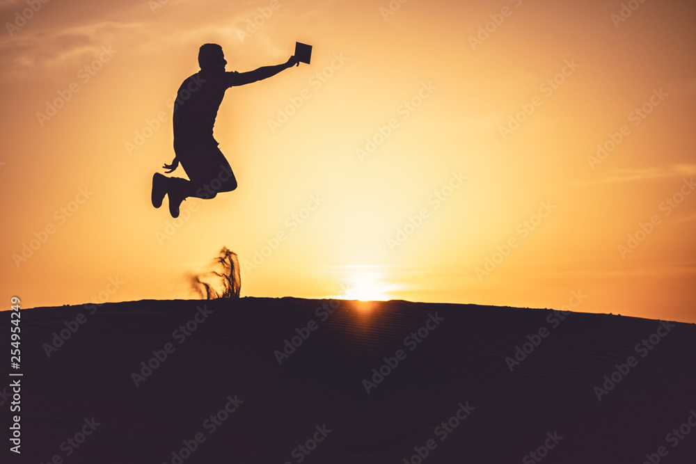 woman like a litte girl playing on the sun of dubai woman like a litte girl playing on the sun of dubai