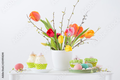 Easter arrangement with tulips and cupcakes