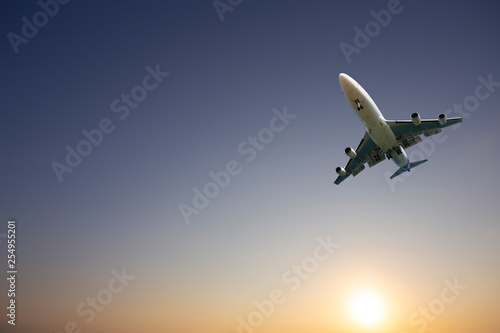 airplane taking off airport sky-diving industry cargo business, concept: passenger Commercial modern navigable Travel and business,Silhouette aircraft is flying above skyline sun