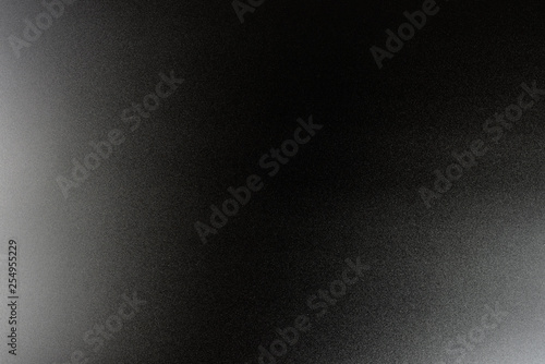 Background in a black, soft color illuminated with a delicate light.