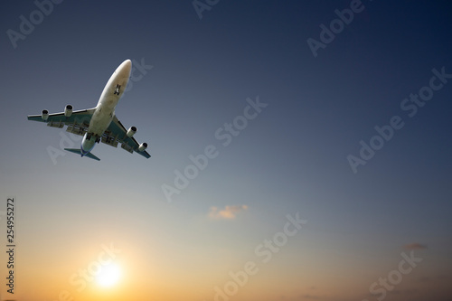 airplane taking off airport sky-diving industry cargo business, concept: passenger Commercial modern navigable Travel and business,Silhouette aircraft is flying above skyline sun