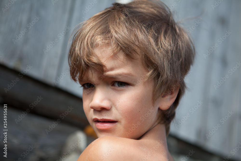 Portrait of pensive, serious boy Portrait of pensive, serious boy