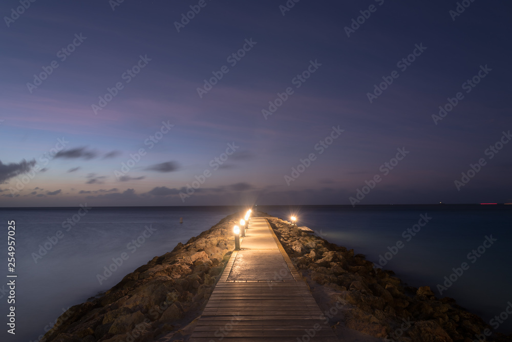 Commercial sports dock in a sunset on the island of Aruba. Aruba
