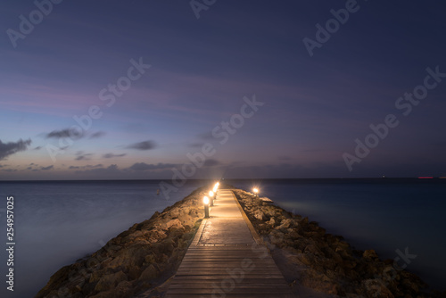 Commercial sports dock in a sunset on the island of Aruba. Aruba
