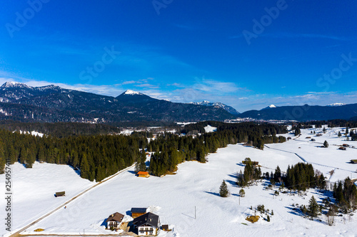 Aerial view, snowy meadow, Mittenwald, Alps and Karwendel mountains, Bavaria, Germany