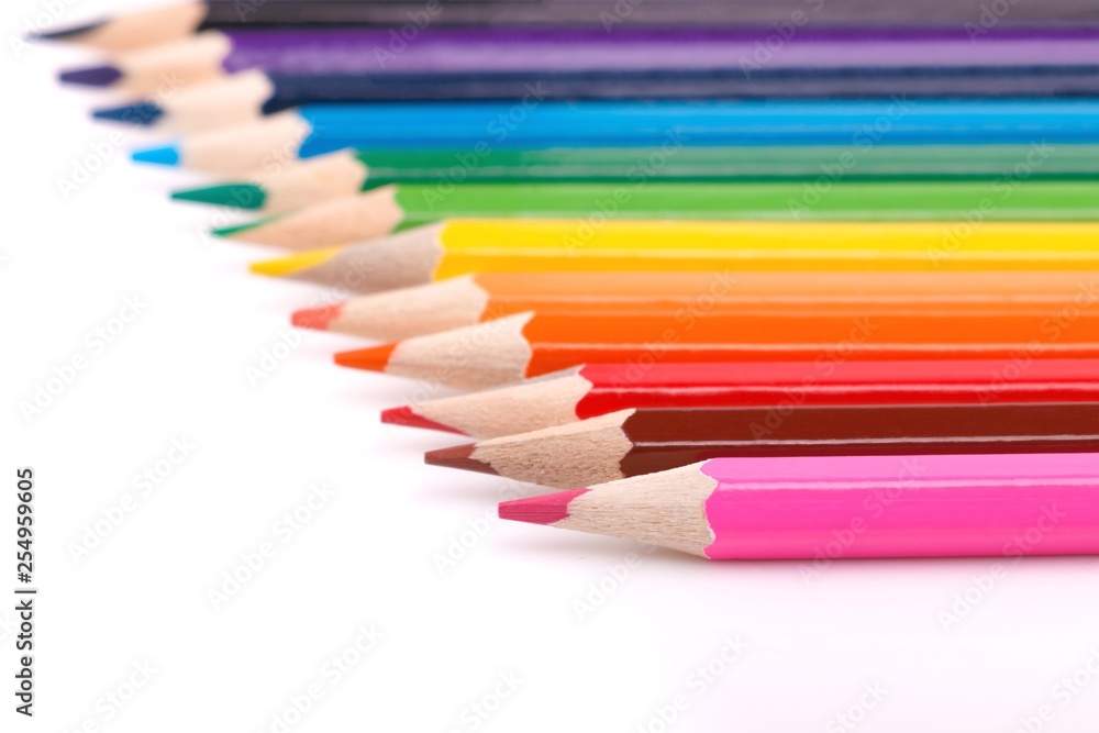 colored pencils on white background. Selective focus colored pencils on white background. Selective focus