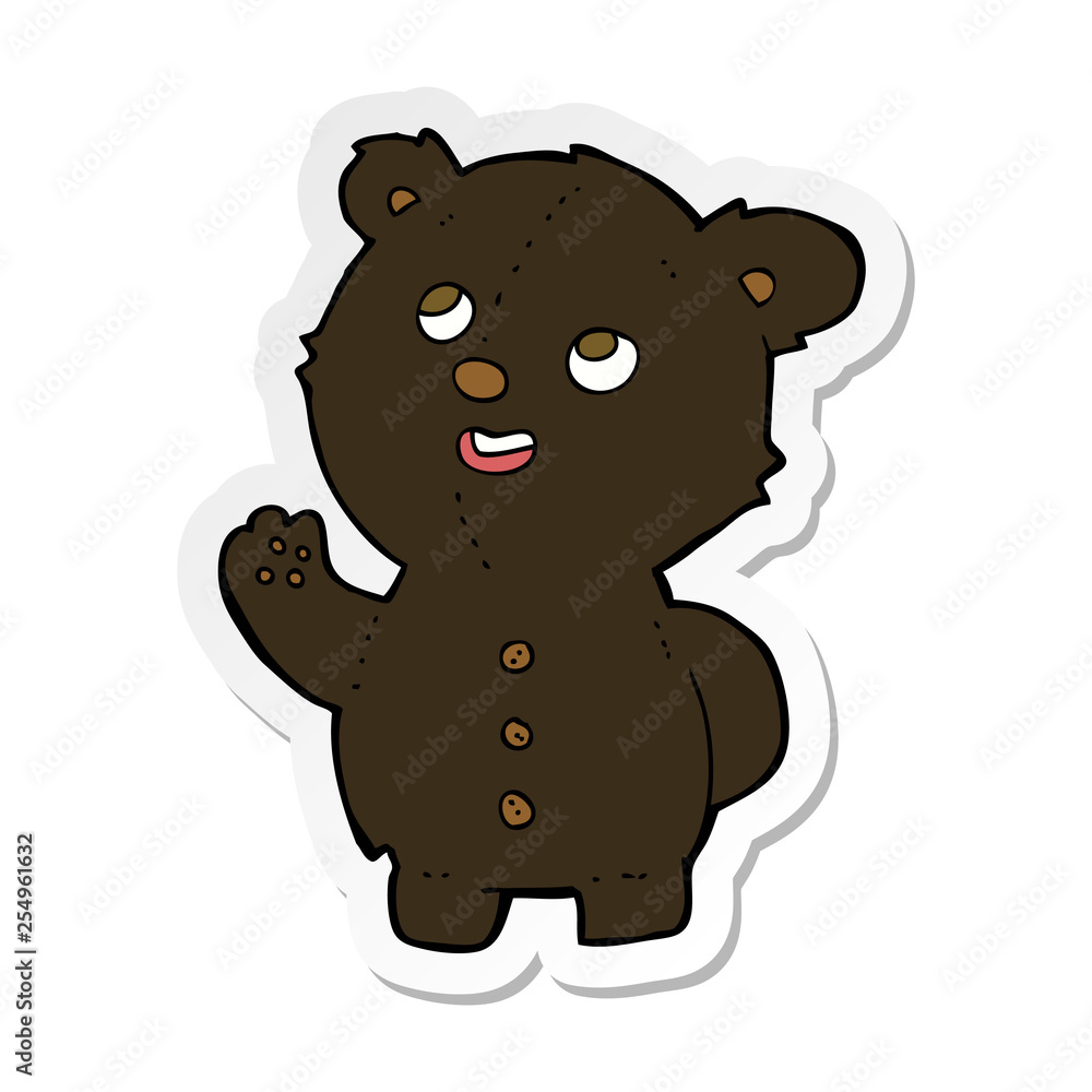 sticker of a cartoon cute black bear cub sticker of a cartoon cute black bear cub
