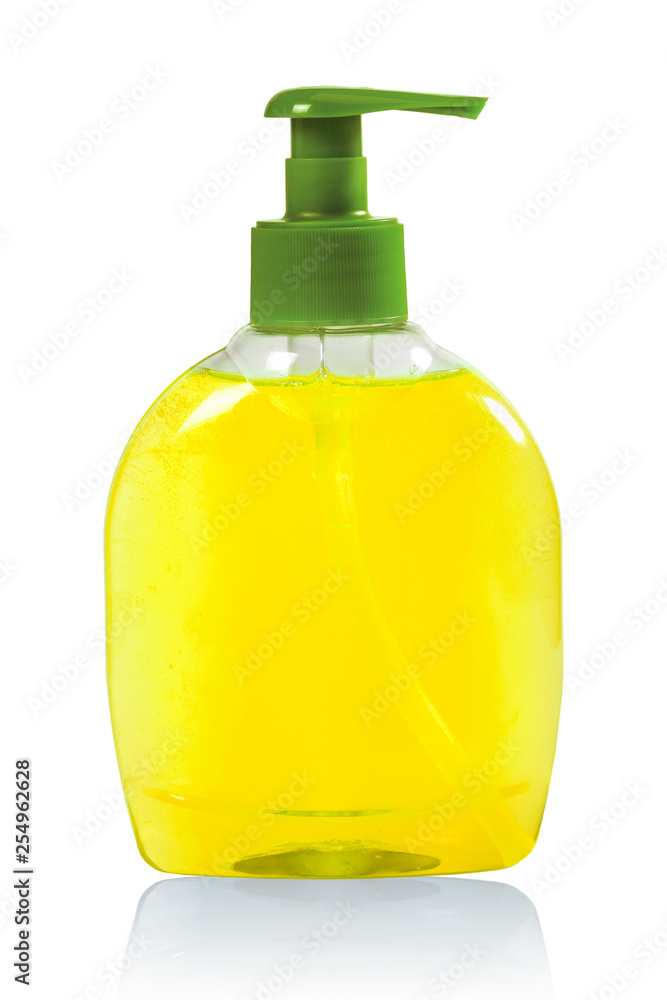 Yellow liquid soap in a plastic bottle on a white background with reflection. Concept of hygiene Yellow liquid soap in a plastic bottle on a white background with reflection. Concept of hygiene