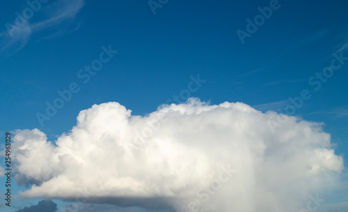 Celestial landscape with beautiful white cloud on background blue sky