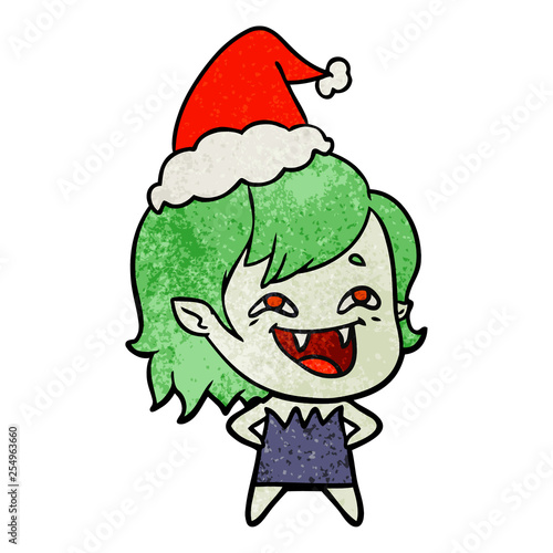 textured cartoon of a laughing vampire girl wearing santa hat