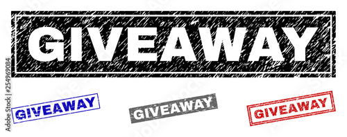 Grunge GIVEAWAY rectangle stamp seals isolated on a white background. Rectangular seals with grunge texture in red, blue, black and grey colors.