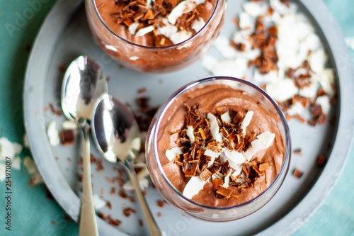 Homemade vegan chocolate mousse with coconut creamand cocoa
