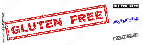 Grunge GLUTEN FREE rectangle stamp seals isolated on a white background. Rectangular seals with distress texture in red, blue, black and grey colors.