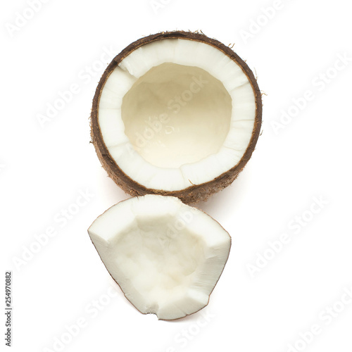 Coconuts half and piece isolated on white background. Tropical fruit. Flat lay, top view
