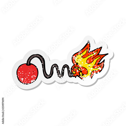 retro distressed sticker of a cartoon bomb with burning fuse