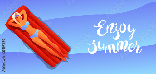 Girl in bikini sunbath and relax.