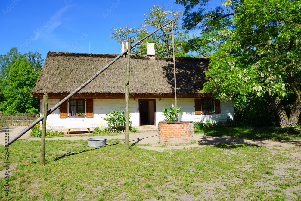 Farm, white wooden buildings of the area of the museum - reconstruction of XX century 