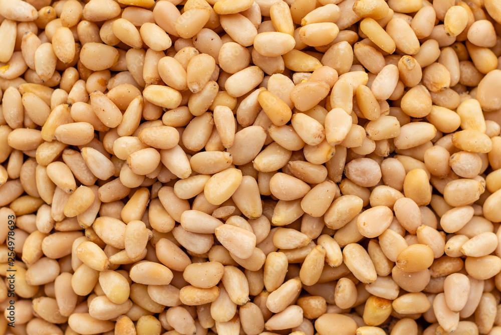 Pine nuts close up. Breakfast, healthy food. It can be used as a background
