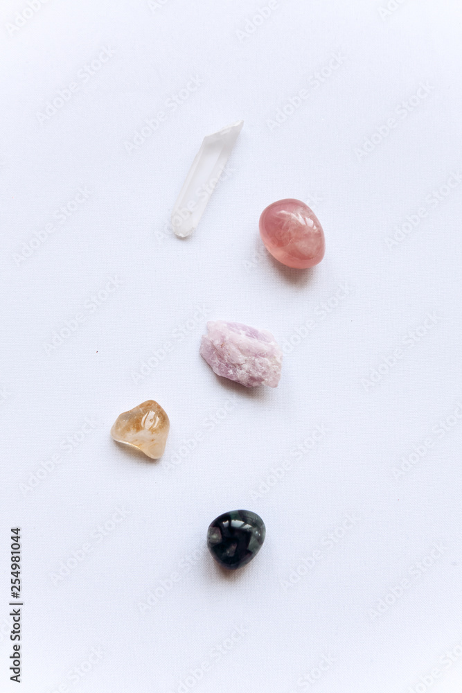A set of minerals. White Quartz, Rose Quartz, Fluorite, Citrine and Kunzite