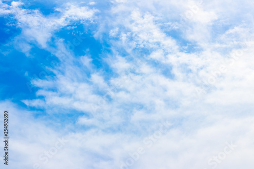 Blue sky background with clouds formation