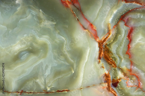 Fototapeta Naklejka Na Ścianę i Meble -  Green onyx with red veins, the surface of natural stone