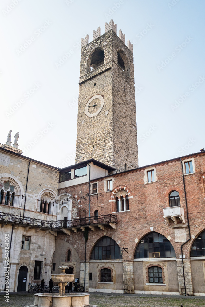 Palazzo del Broletto with fountain and tower