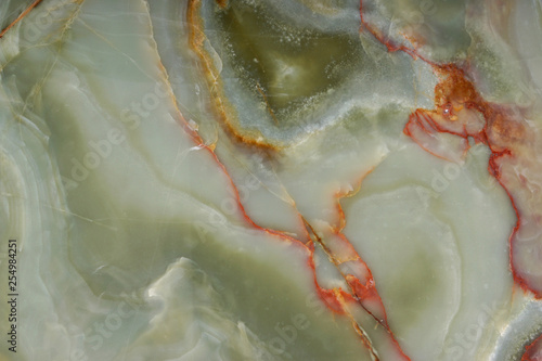 Fototapeta Naklejka Na Ścianę i Meble -  Green onyx with beautiful veins, the surface of natural stone for the interior