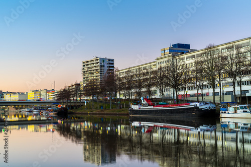 Germany, Beautiful city saarbruecken reflecting in saar river at dawn