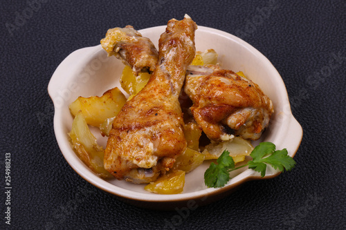 Roasted chicken legs with potato