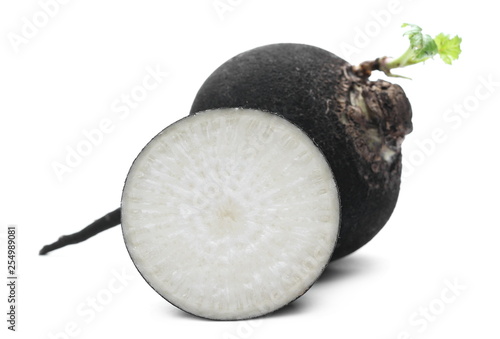 Black radish half isolated on white background