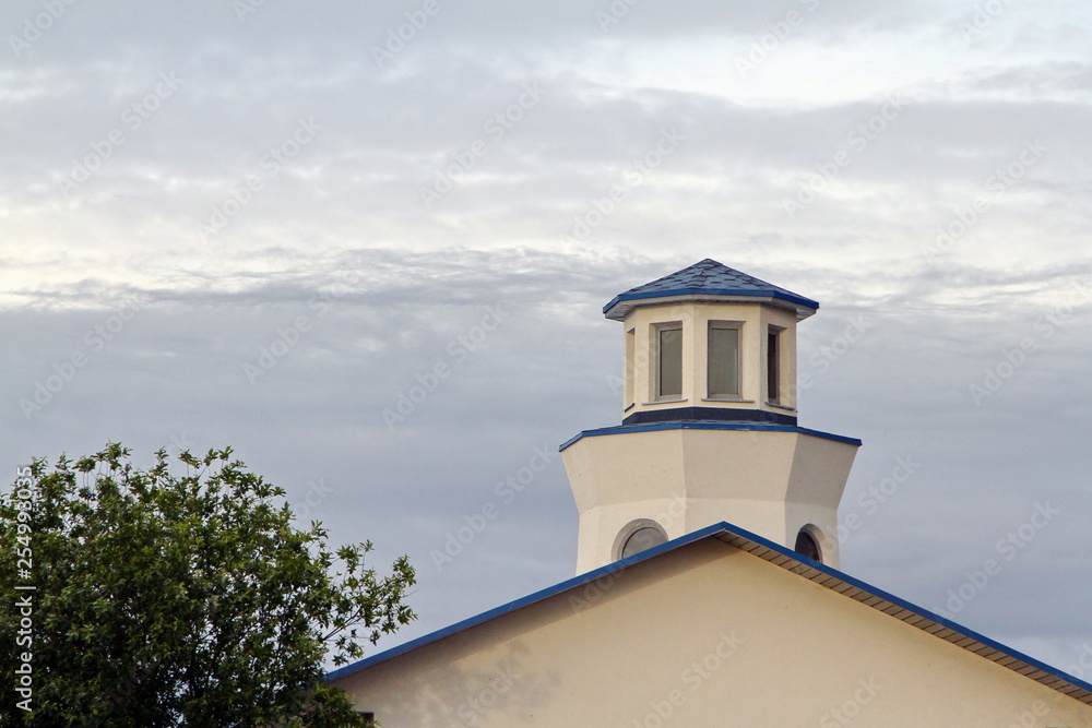 Building with a tower against the sky