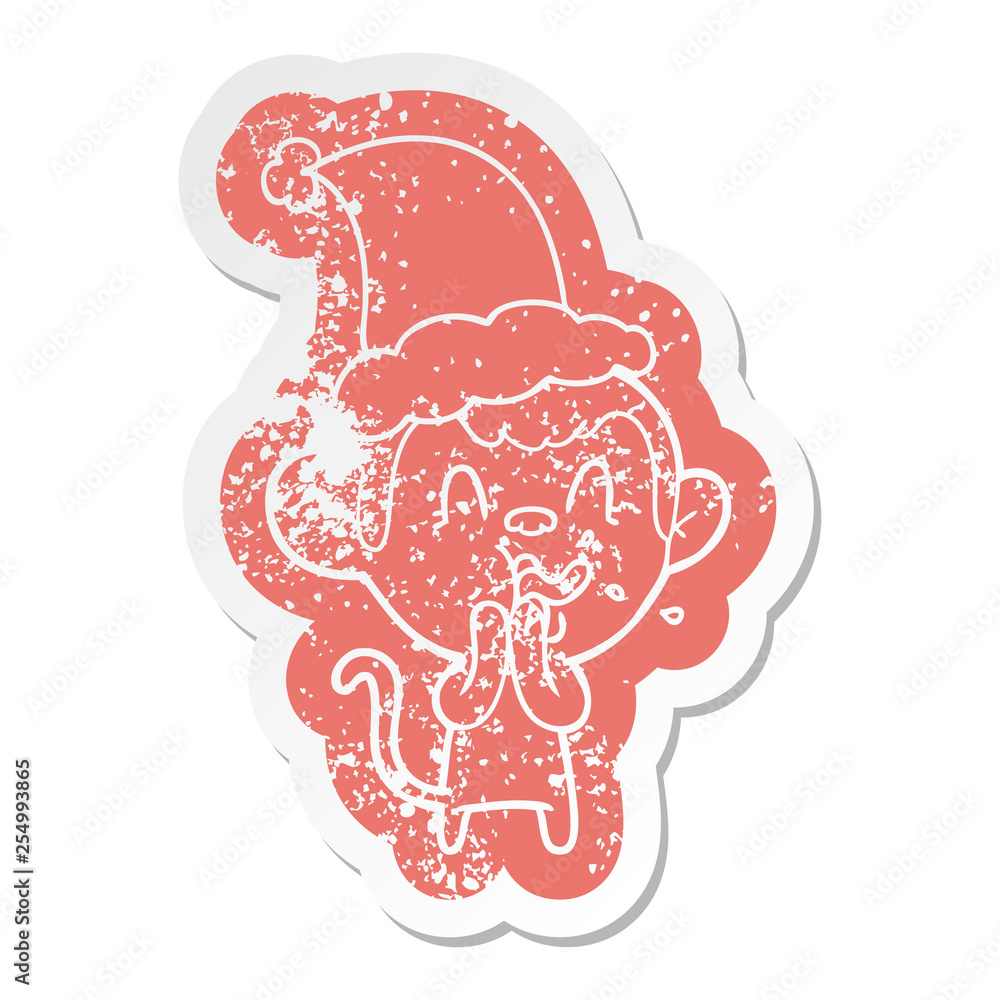 crazy cartoon distressed sticker of a monkey wearing santa hat crazy cartoon distressed sticker of a monkey wearing santa hat