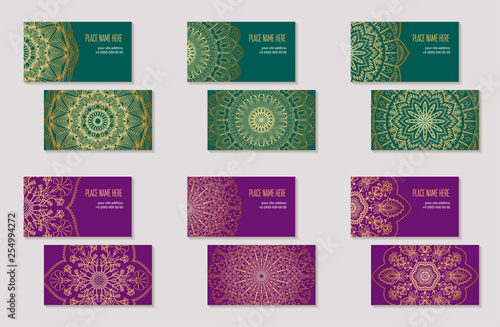 Set of business cards with abstract ethnic pattern. The element of corporate identity. Round golden mandala on green and purple background. Vector illustration