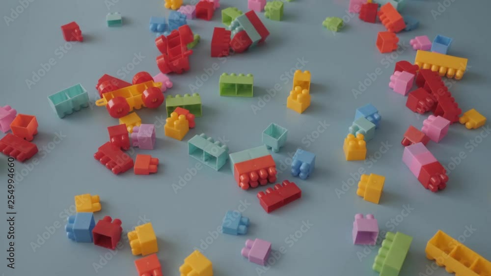 Toy block pieces on celestial background Toy block pieces on celestial background