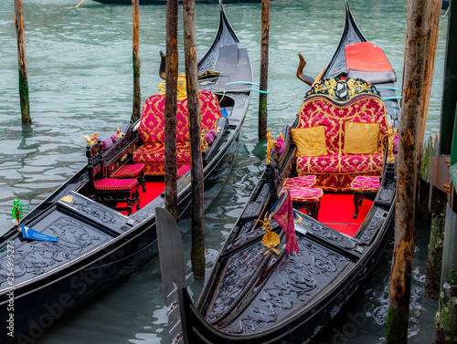 Venice / Italy 19 february 2019 :Gondols ,the symbol of venice , parked in the canal