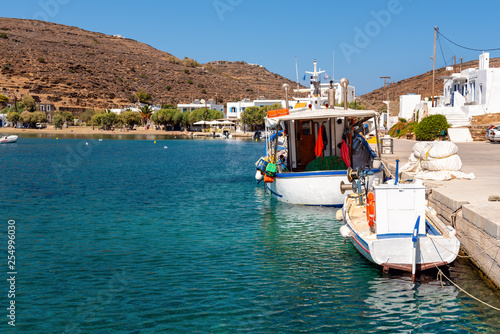 Fishing boats moored in the port of the picturesque village of Faros in Sifnos. Greece
