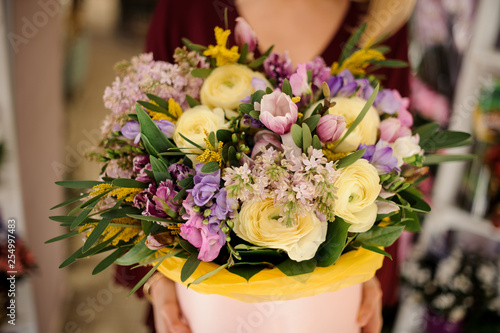 Beautiful round box with bunch of flowers