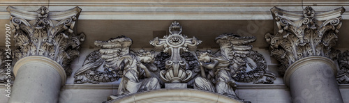 A close-up exterior view on a sculptural composition above the entrance of Berlin Cathedral