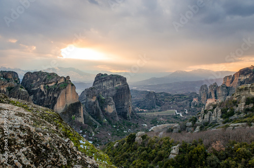 Sunset in Meteora, a rock formation in central Greece, hosting one of the largest and most precipitously built complexes of Eastern Orthodox monasteries, second in importance only to Mount Athos.