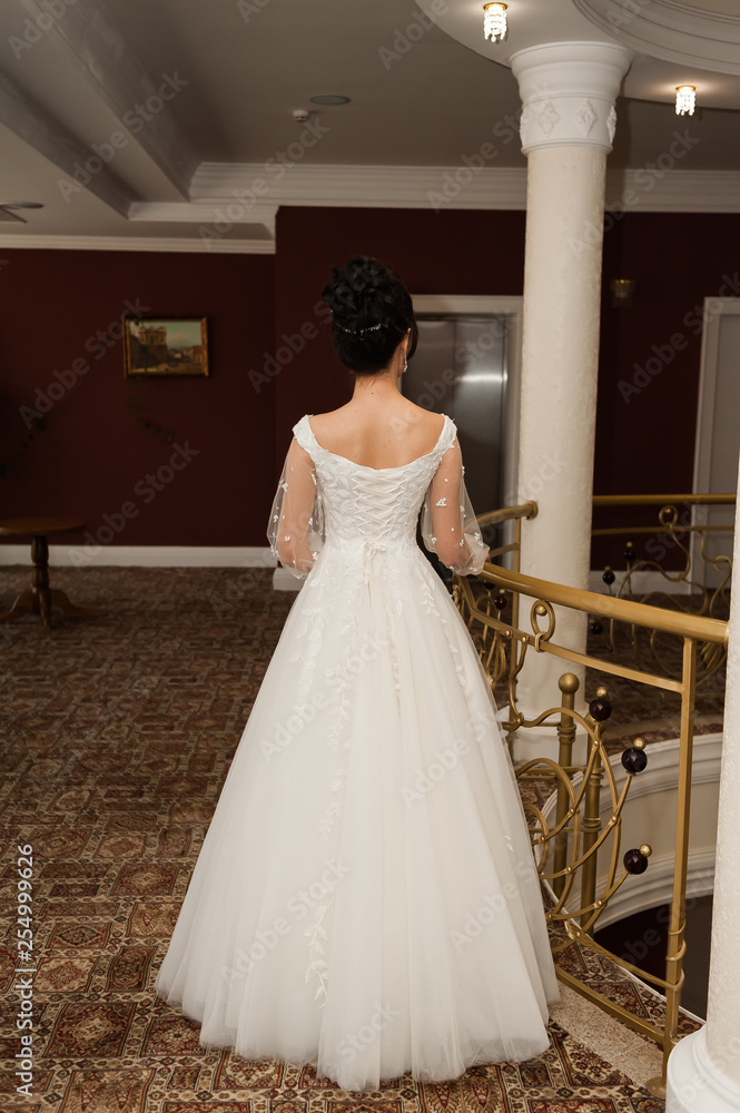 beautiful bride in chic dress. delicate bride with long hair. girl in lace dress with loop in studio Bride%27s morning in a stylish interior beautiful bride in chic dress. delicate bride with long hair. girl in lace dress with loop in studio Bride%27s morning in a stylish interior